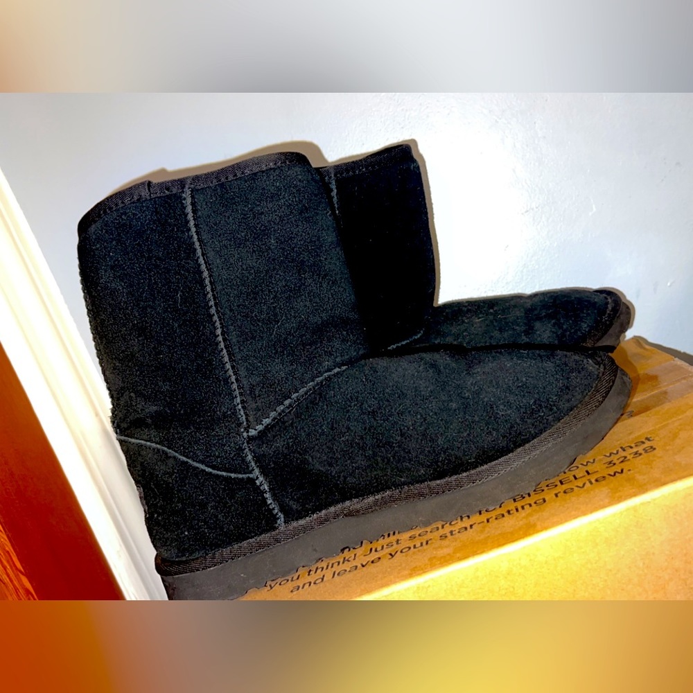 Black Uggs. Worn once. Looks new.